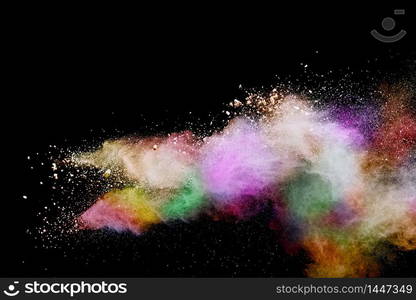 Abstract multicolor powder on black background. holi festival.