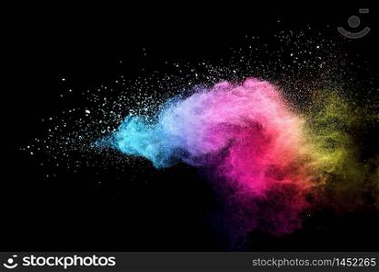 Abstract multicolor powder on black background. holi festival.