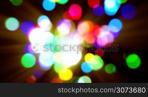 Abstract multicolored bokeh lights defocused motion background