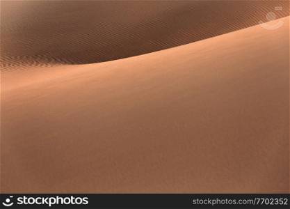 Abstract natural background, Liwa desert in Abu Dhabi, beautiful sandy landscape, safari, travel to United Arab Emirates