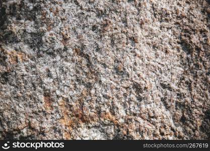 Abstract nature grunge background, Rustic and rough of dark brown stone surface texture, Closeup with detail.