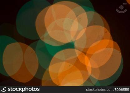 Abstract of Christmas background of defocused lights with decorated tree