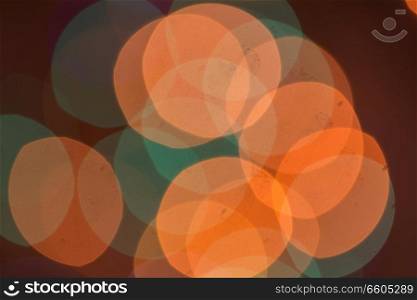 Abstract of Christmas background of defocused lights with decorated tree