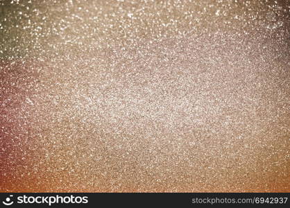 Abstract of shining bokeh glitters for background with copy space. Christmas and New Year wallpaper decorations concept.