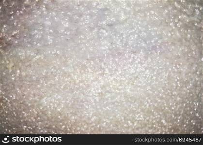 Abstract of shining bokeh glitters for background with copy space. Christmas and New Year wallpaper decorations concept.