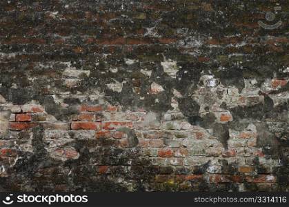 Abstract old colorful brick wall as background