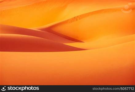 Abstract orange sandy desert background, wilderness of United Arab Emirates, scenes destination, travel and tourism concept