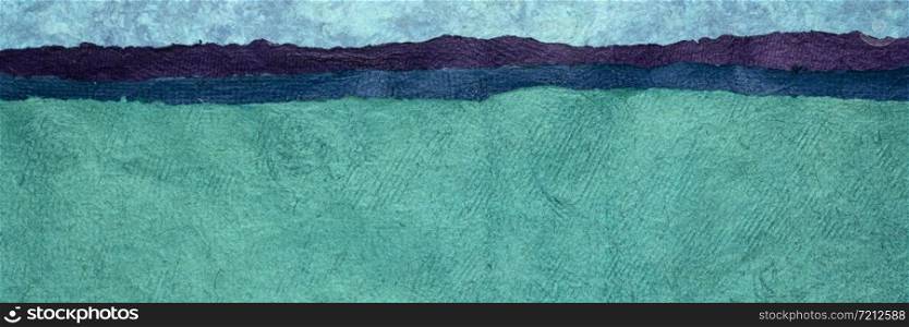 abstract paper landscape panorama created with sheets of rough textured colorful handmade paper, water and sky theme