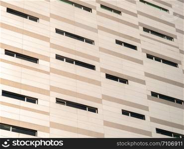 Abstract pattern of modern building exterior with sunlight