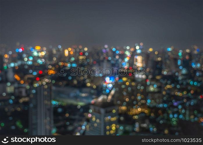 Abstract Photo blurred bokeh of bangkok cityscape at twilight time, background concept
