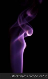 Abstract photo of purple smoke on black background