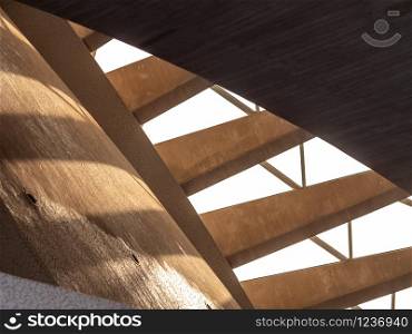 Abstract photo of sun light shining through modern architecture concrete stairs. Abstract image of sun light shining through modern architecture concrete stairs
