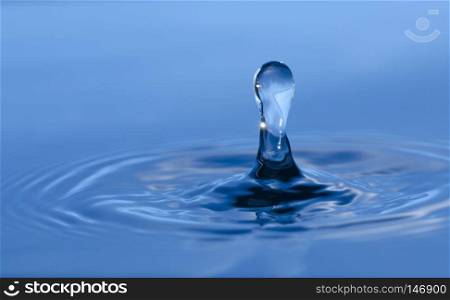 Abstract picture of water splash like crown, Blue background