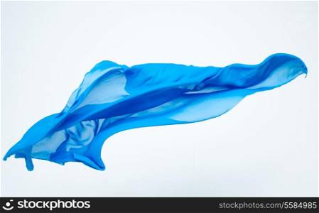 abstract piece of blue fabric flying, studio shot, design element
