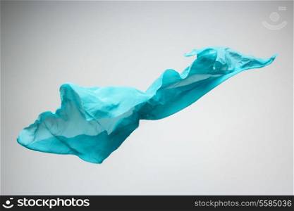 abstract pieces of fabric flying, high-speed studio shot