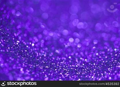 Abstract purple glitter background. Abstract purple glitter light bokeh holiday party background