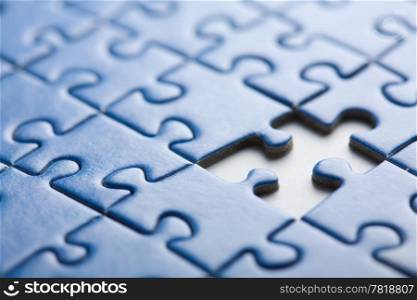 abstract puzzle background with one piece missing