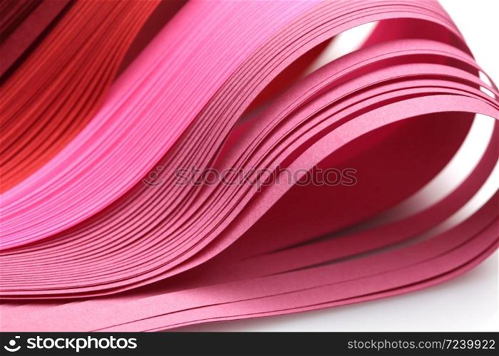 Abstract red and pink color wave strip paper background. Soft focus.