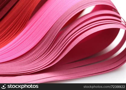 Abstract red and pink color wave strip paper background. Soft focus.