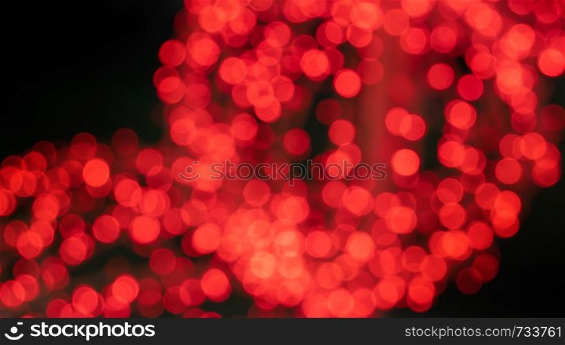 Abstract red color with bokeh defocused lights background. Abstract color background