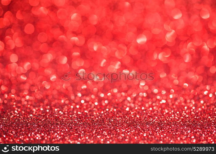 Abstract red glitter background. Abstract red glitter light bokeh holiday party background