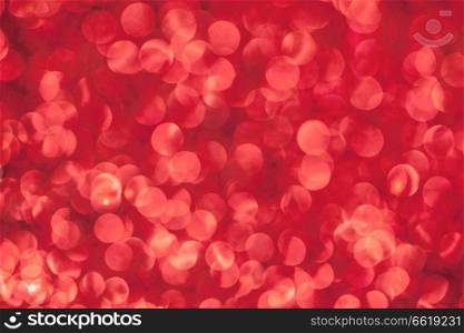 Abstract red glitter light bokeh holiday party background. Abstract red glitter background