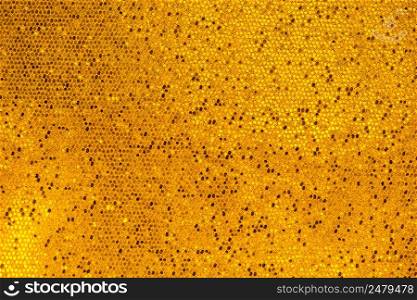 Abstract shiny gold scales background texture