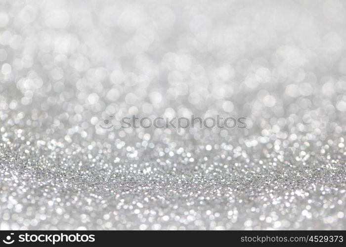 Abstract silver glitter background. Abstract silver glitter light bokeh holiday party background