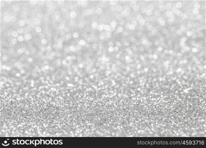 Abstract silver glitter background. Abstract silver glitter light bokeh holiday party background