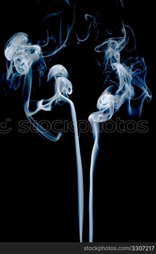 Abstract smoke isolated on dark background.