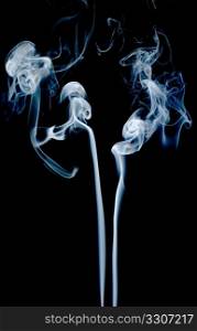 Abstract smoke isolated on dark background.