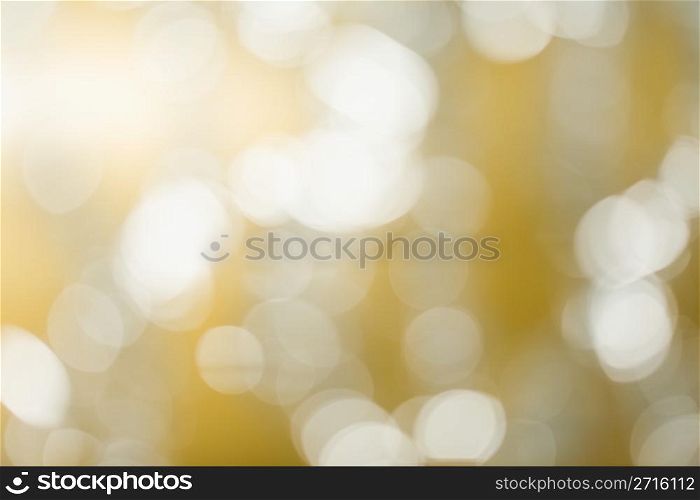 Abstract sparkling golden light background
