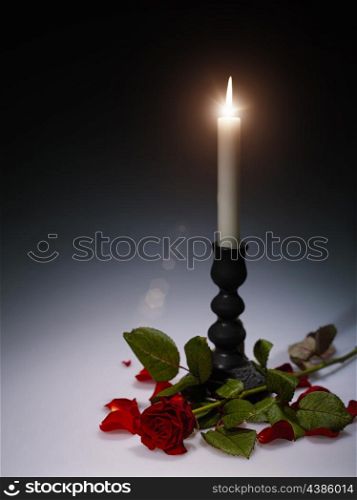 Abstract still life with burning candle for your design
