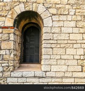 Abstract Stone Wall Background Image with windows. Great for background use.