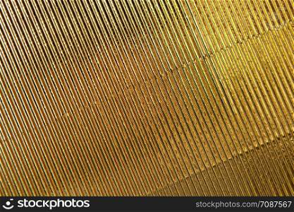Abstract texture. Gold corrugated paper background. Copy space for text. Horizontal. Celebration, holidays concept, harvesting for mock up