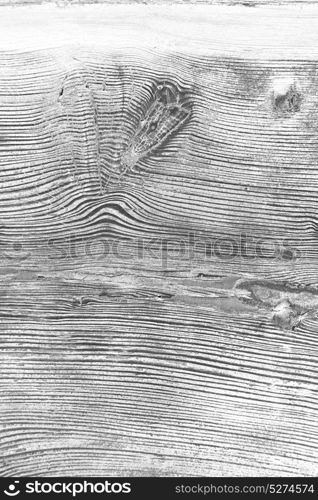 abstract texture of a brown antique wooden old door in italy europe