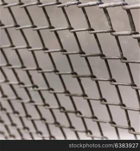 abstract texture of a metal grid surface like background in the sky