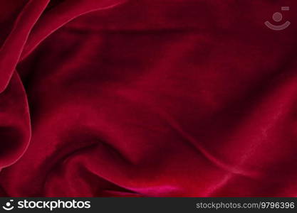 abstract texture of draped viva magenta velvet background. red velvet background