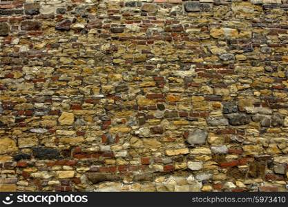 abstract textures of stones in a wall in prague