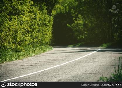 Abstract travel backgrounds with asphalt road and green tunnel