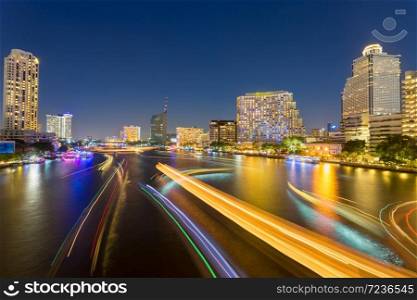 abstract urban twilight bokeh and reflect ship transport light from water in city background