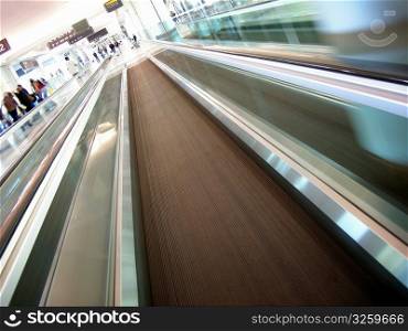 Abstract view of airport moving sidewalk.