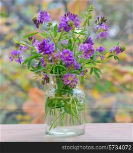 abstract violet flowers in vase