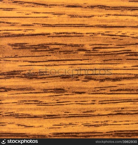 Abstract wood texture with focus on the wood&rsquo;s grain. Mahogany wood