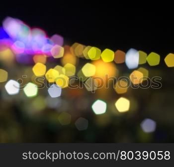 Abstract yellow and violet night lights with blurred background