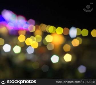 Abstract yellow and violet night lights with blurred background