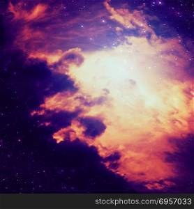 Abstractive Space Background. Dark space background with clouds and stars.
