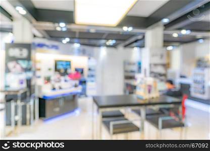 Abstrast Blurred background : Retail shop in shopping mall for consumerism background