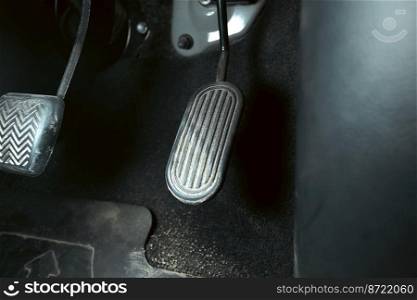Accelerator pedal of a car with dirty stains on the pedals in a car, automotive parts concept