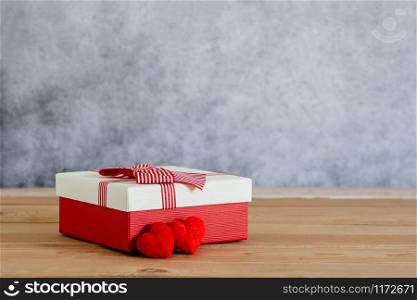 Accessories of decorations valentine&rsquo;s day background concept.Essential items colorful pastel love shape with gift box on modern rustic brown wooden & grey cement.blank space for mock up design.
